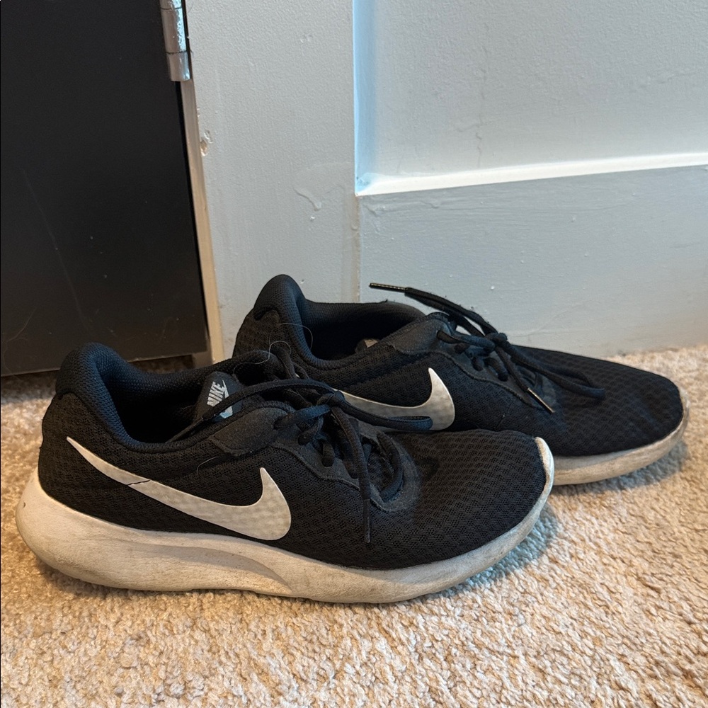 Nike Black Mesh Sneakers with White Swoosh